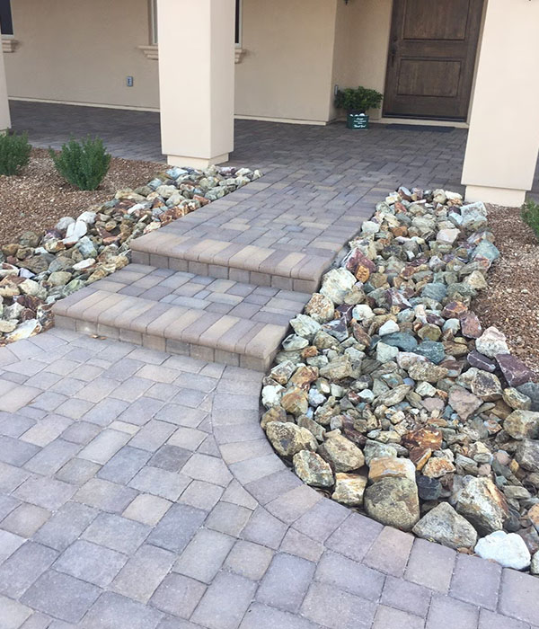 new patio and steps in front of house
